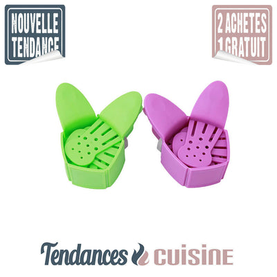 Passoire casserole Compactable auto fixante verte et violette démonstration de compactage gain de place - Tendances-cuisine.fr